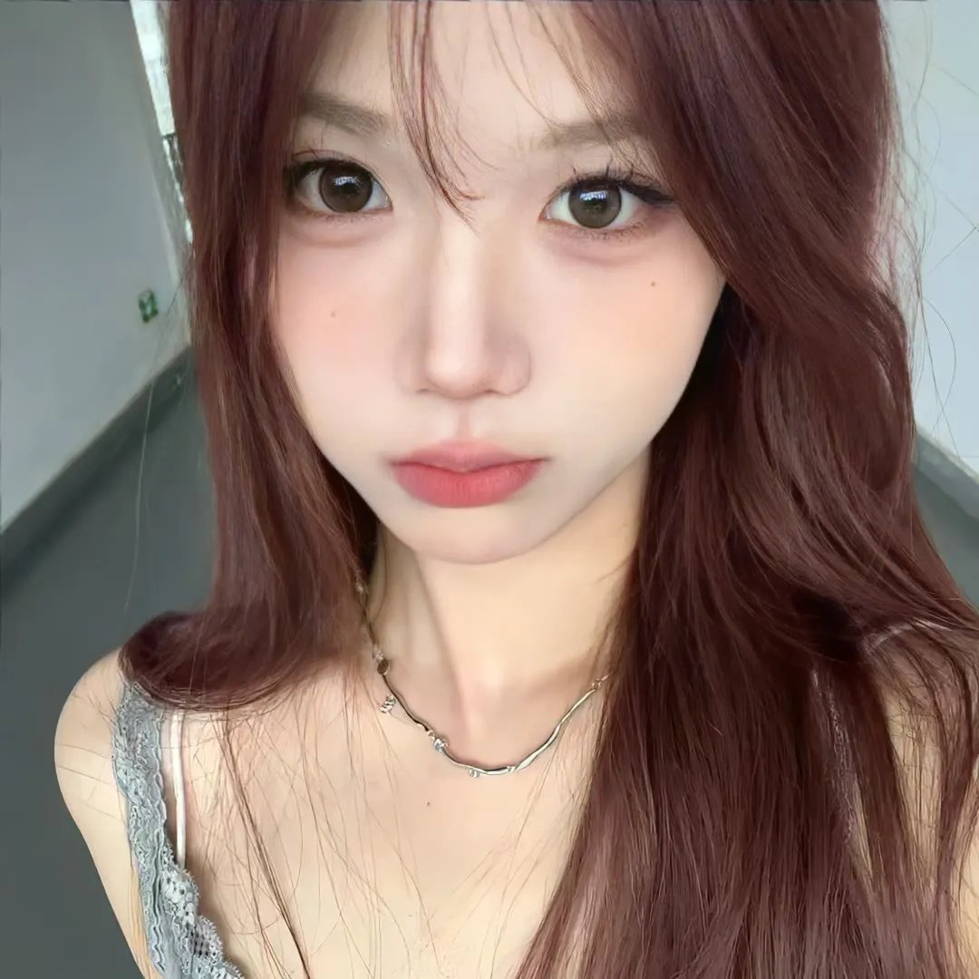 绿杨移作两家春